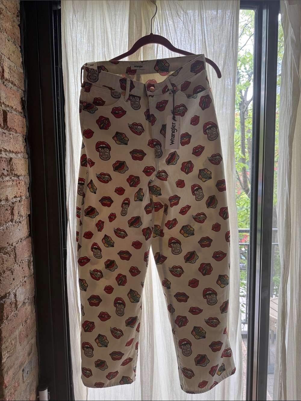 Wrangler High Rise White Barrel Jeans with Red Lip & Multicolor Graphic Print